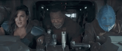 People Sitting In Car With Blue Mask GIF