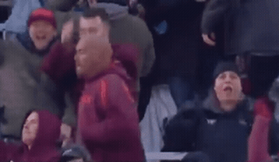 People Sitting In Stadium Watching Game GIF