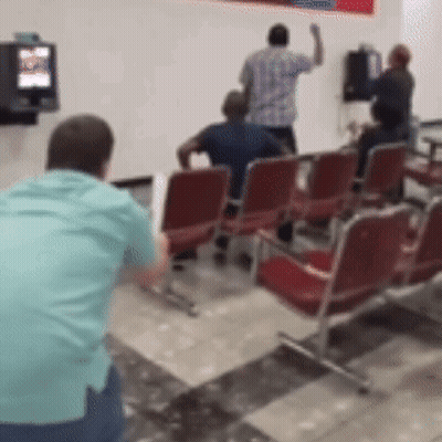 People Sitting In Waiting Room GIF