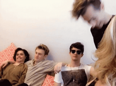 People Sitting On Couch With Sunglasses GIF
