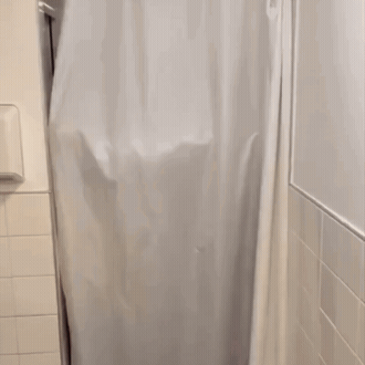 People Standing Behind Shower Curtain GIF