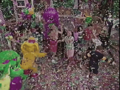 People Standing In Confetti Room GIF
