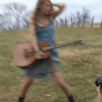 People Standing In Dark Room GIF