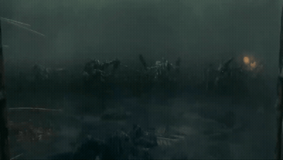 People Standing In Dark Room With Light GIF