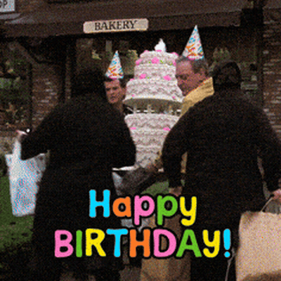 People Standing In Front Of Bakery And Birthday Cake GIF