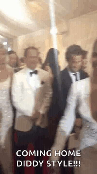 People Standing In Room With Sword GIF
