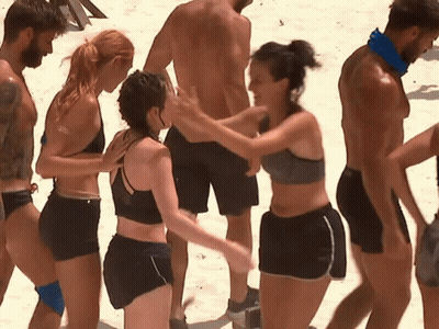 People Standing On Beach With Bandana GIF