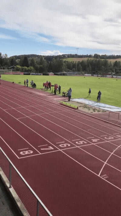 People Standing On Numbered Track 1 Through 9 GIF