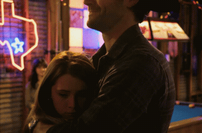 People Standing One In Yellow Jacket GIF