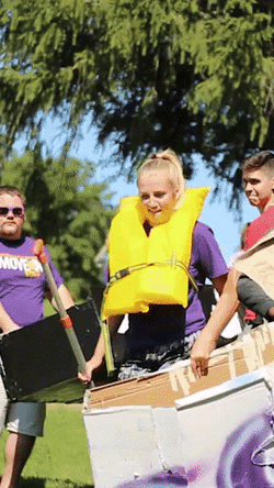 People Struggle To Row The Boat They Made GIF