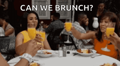 People Toasting With Orange Juice GIF