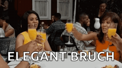 People Toasting With Orange Juice GIF