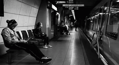 People Waiting For Train At Station GIF