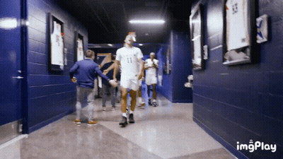 People Walking Down Hallway Number 11 GIF