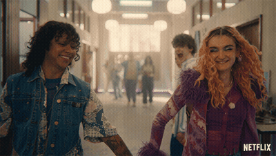 People Walking Down Hallway With Netflix GIF