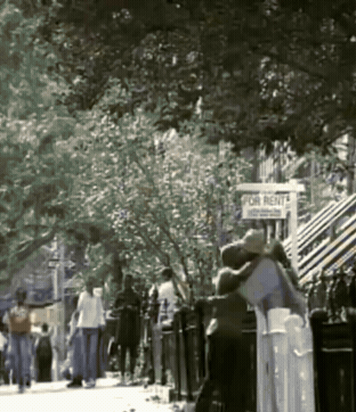 People Walking Down Street With For Rent Sign GIF
