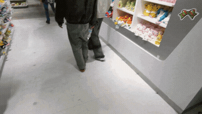 People Walking In Store With Pokemon Sticker GIF