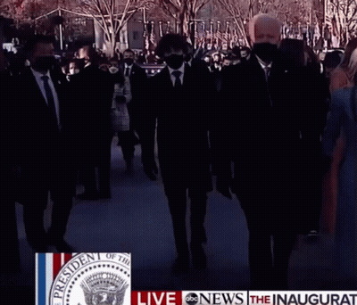 People Walking Past President Of The United States Sign GIF