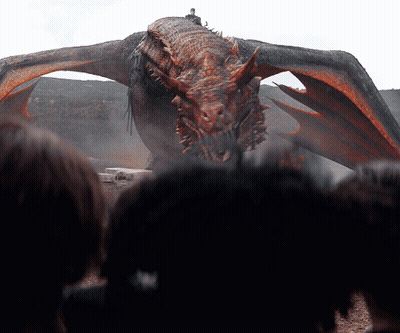 People Watching Dragon With Wings Spread GIF