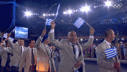 People Waving Small Flags Of Greece At Olympic GIF