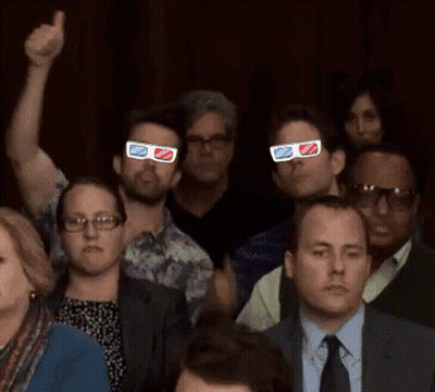 People Wearing 3D Glasses Raising Hands GIF