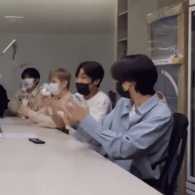 People Wearing Face Masks Clapping GIF