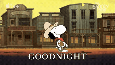People With American Flags And The Black Shop Sign GIF