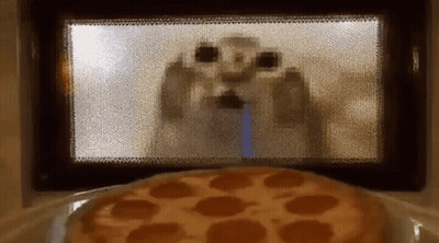 Pepperoni Pizza In Microwave With Cartoon Character GIF