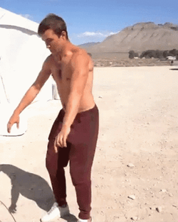 Perfect Backflip In The Sand GIF