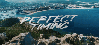 Perfect Timing Is Written On A Rocky Hill Overlooking The Ocean GIF