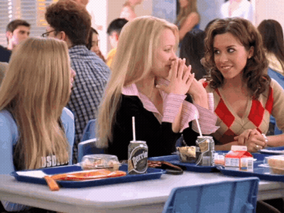Perrier Can Beside Two Other Cans GIF