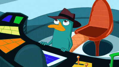 Perry The Platypus In Hat Sitting In Chair GIF