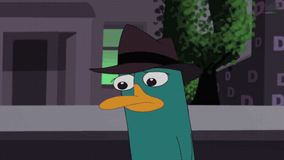 Perry The Platypus Sitting At Table With Cupcake GIF