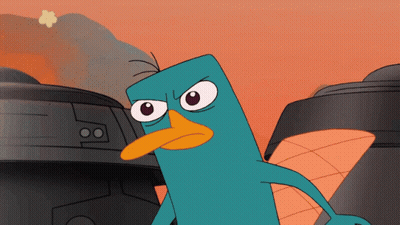 Perry The Platypus Standing In Front Of Building GIF