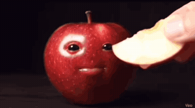 Person Biting Apple With Face GIF