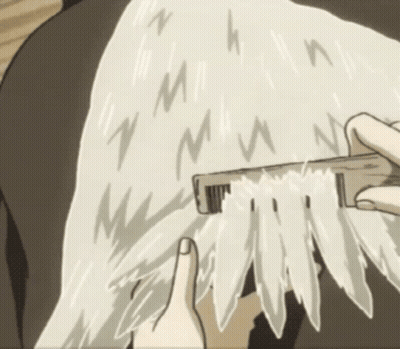 Person Brushing Hair With M Comb GIF