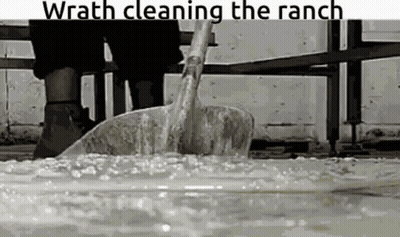 Person Cleaning Ranch With Shovel GIF