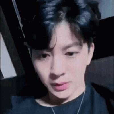 Person Close Up Black Shirt Necklace GIF