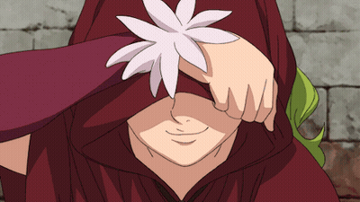 Person Covering Eyes With Flower On Hand GIF