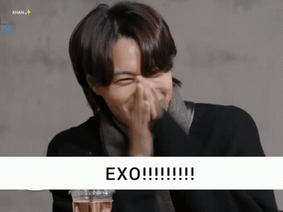 Person Covering Face With Exo GIF