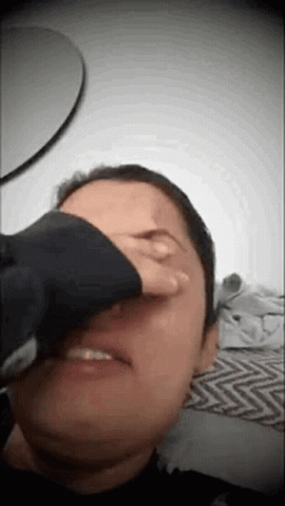 Person Covering Face With Hand GIF