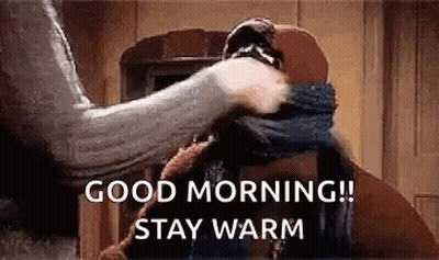 Person Covering Face With Scarf Saying Good Morning Stay Warm GIF