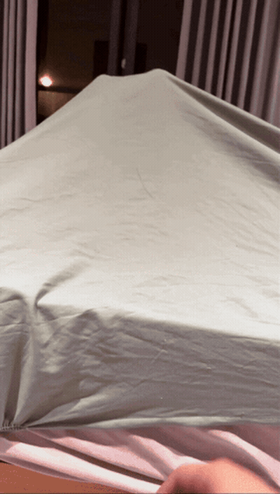 Person Covering Mattress With Sheet GIF