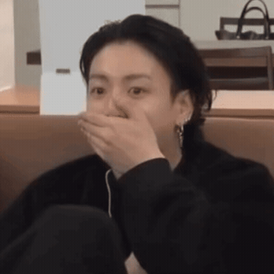 Person Covering Mouth With Hand GIF
