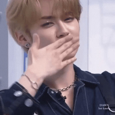 Person Covering Mouth With Hands GIF