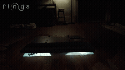 Person Crawling In Dark Room Saying Rings GIF