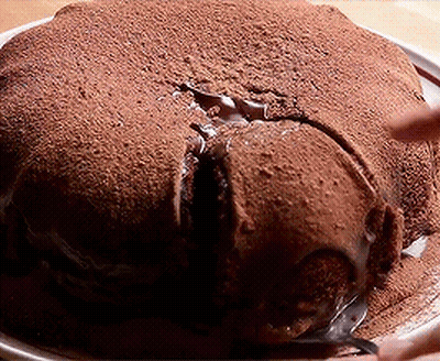 Person Cutting Chocolate Cake GIF