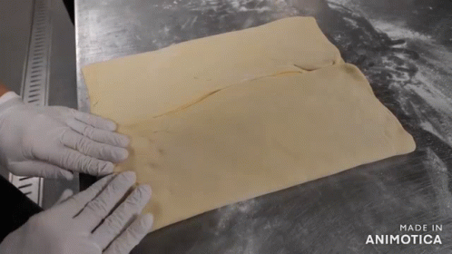 Person Cutting Dough Made In Animotica GIF