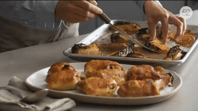 Person Cutting Food With Knife In Front Of Pan Number 59 GIF