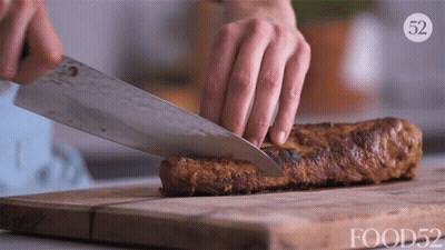 Person Cutting Meat On Board With 52 GIF